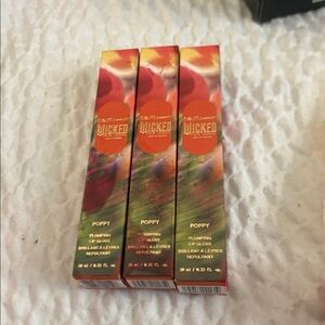 REM beauty x Wicked plumping lip gloss